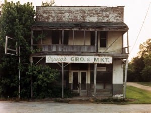 Joel Sternfeld, The Former Bryant’s grocery, Money, Mississippi, 1994.