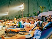Reiner Riedler, Indoor Pool Tropical Islands: Tourist watching the evening show, Brandenburg, Berlin. Fake Holidays. © Reiner Riedler / Anzenberger.
