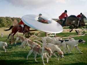 Tim Walker, Kinga Rajzak in Flying Saucer with Members of the West Percy Hunt, 2009. Eglingham Hall, Northumberland.