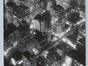 Berenice Abbott (American, 1898–1991). <i>The Night View,</i> 1934 (printed 1974). Gelatin silver print, 13 ¾ x 10 ¾ inches. The Museum
of the City of New York, 79.147.2. Image courtesy Philadelphia Museum of Modern Art. © 2018 Estate of Berenice Abbott/ Getty Images.